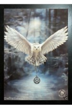 BLACK FRAMED ANNE STOKES ART -