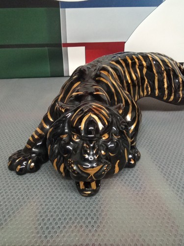 Black and gold tiger - and,
