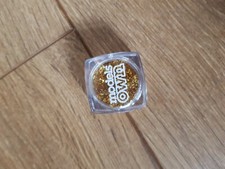 Models own nail glitter. Gold.