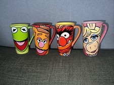 Set of 4 rare ceramic mugs