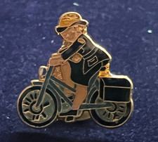 FEMALE TRAFFIC WARDEN ON BICYCLE POLICE PIN BADGE