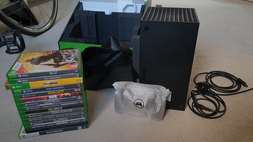 Xbox series 1tb with sealed - with,