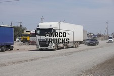 Truck Photo DAF XF Box Trailer Kyrgyzstan White #w2ws