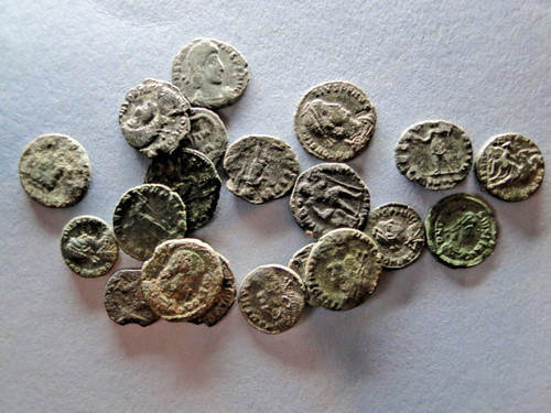 Roman bronze coin with - x,