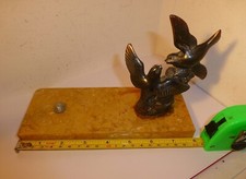 ANTIQUE BRASS BIRDS on a