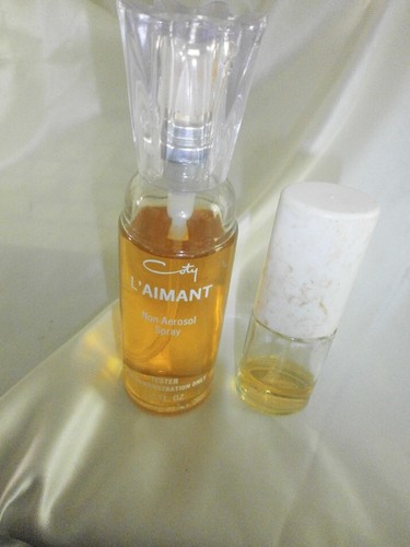 Coty aimant oz - 1.8,