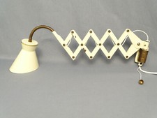 Double Conical SIS Scissor