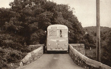 DEVON -  BUS SQUEEZING  ACROSS NEW BRIDGE DARTMOOR