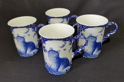 Blue calico cat - x,