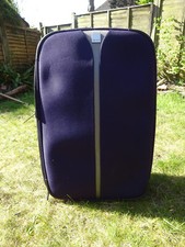 Purple, Tripp, wheel-along suitcase, excellent condition 