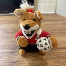 Basil Brush Holding A Football