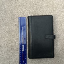 TUMI Ultimate Travel Wallet