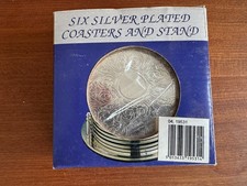 Vintage Silver Plated 7-Piece Coaster Set with Ornate Floral Design - unused