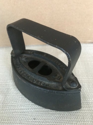 Antique sad iron with handle - with,