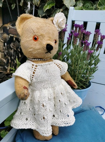 Hand knitted teddy bear