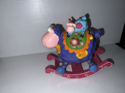 Whimsical colorful rocking cow - colorful,