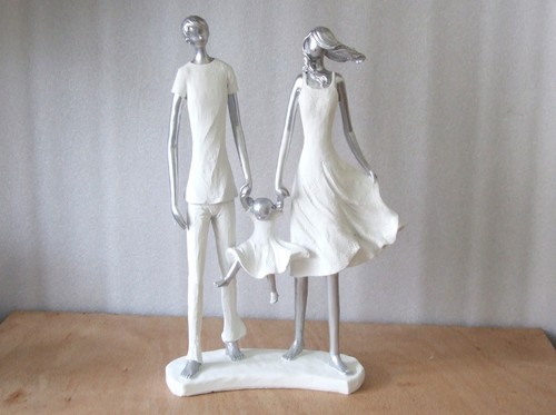 Loving family sculpture - family,