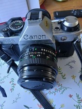 Canon AE-1 Program 35mm SLR Film Camera with 50mm f/1.8SC lens Kit