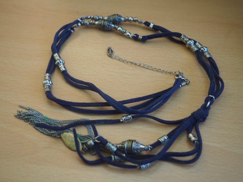 Next silver tone bead with