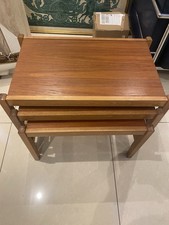 A set of mid-century mahogany nesting tables from the 1950-1960s