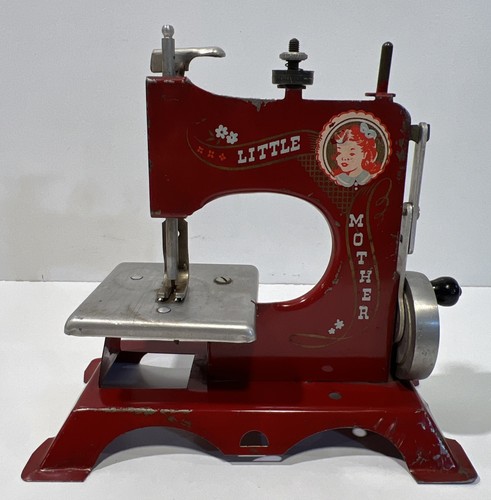 Vintage hand crank metal - hand,