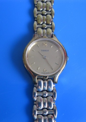 Ladies gold coloured tissot - gold,