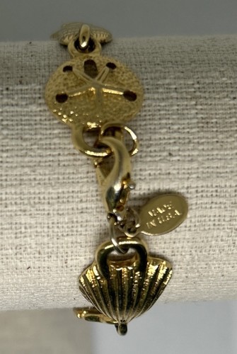 Gold tone shell link bracelet - gold-tone,
