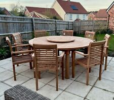 round 6ft 8 seater teak garden table set with lazie suzie and stacking chairs