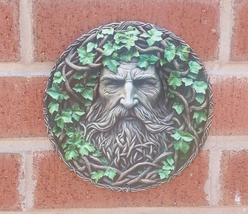Leafy green man face plaque - man,