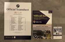 Millwall V Stoke programme, team-sheet & badge 21/10/25 plus 3 extra teamsheets