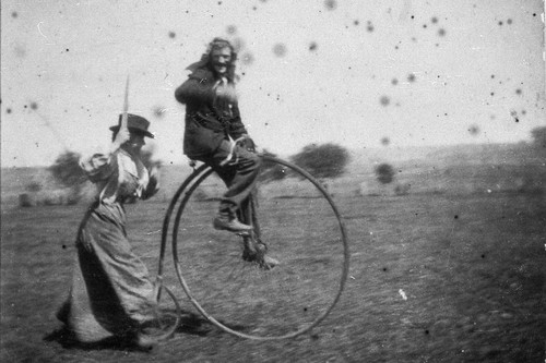 Man penny farthing - on, penny-farthing
