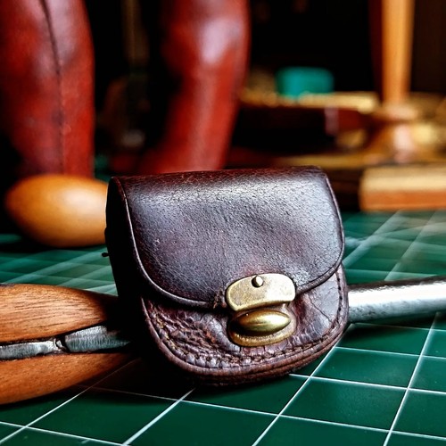 Antique leather sovereign coin - antique,