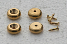 A  SET OF 4 STYLISH CAST BRASS BUN STYLE CLOCK FEET.