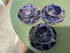 3 antique child’s cups and saucers