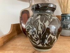 Miranda Thomas black carved