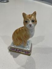 Michael Sutty  Ginger Cat Sitting On A Pedestal