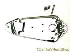 Chrome semi-acoustic guitar