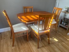 Yew finish extending dining