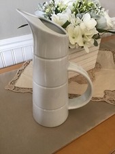 WHITE POTTERY WATER JUG IN VERY GOOD GONDITION