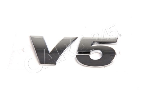 Genuine rear trunk badge - v5,