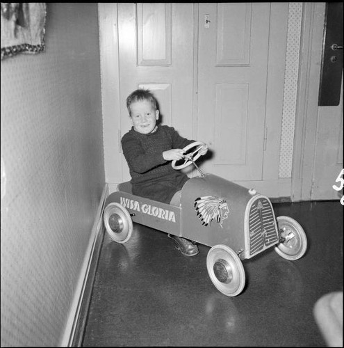 Boy with pedal car school - car, at