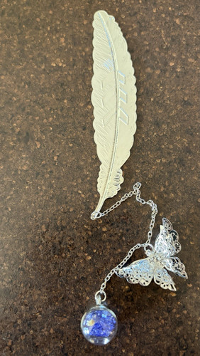 Silver coloured metal feather - coloured,