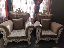 Two Single Chairs , Coffee Table And a Three In One Chair. In Good Condition.