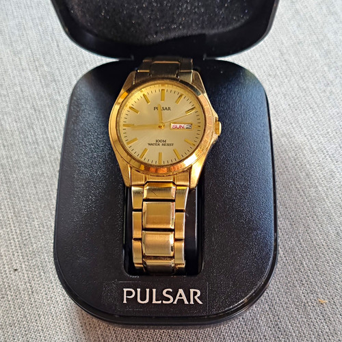 Pulsar gold tone quartz - pulsar,