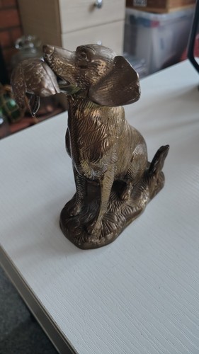 Brass hunting dog with - , duck