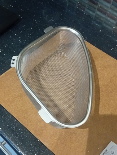 Triangular corner sink basket - corner,