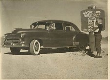 Boy W/ Binoculars Stands by
