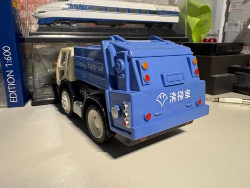 Japan garbage truck pullback - garbage,