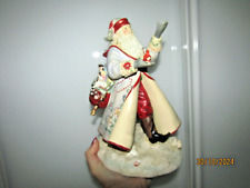 Magic Christmas by Lenox - A Christmas Traveler Figurine by Lynn Bywater
