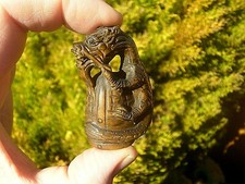 Hand Carved wood netsuke of a